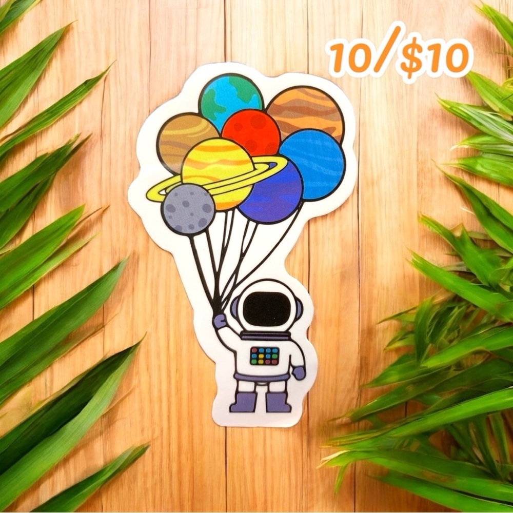 Astronaut with Planet Balloons Sticker – 2 3/4”